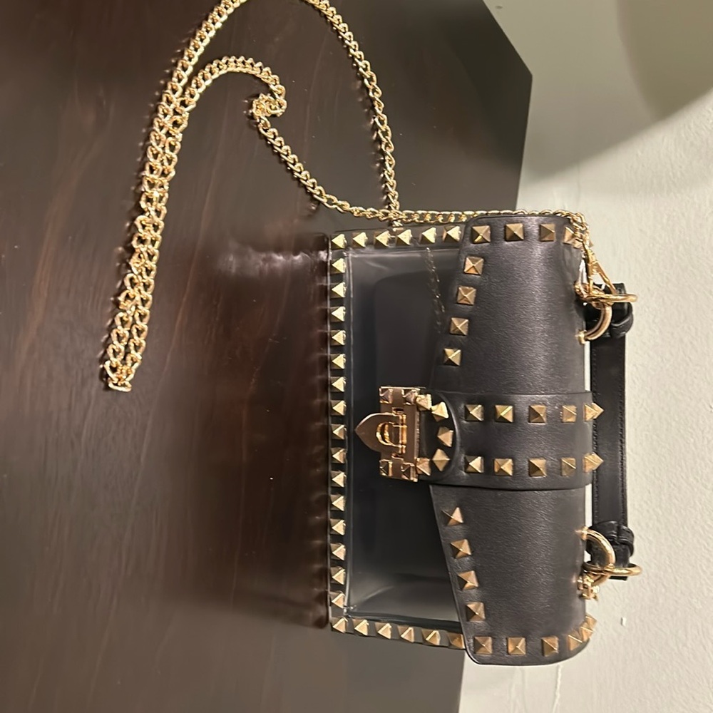 Studded purse with detachable gold chain. New!